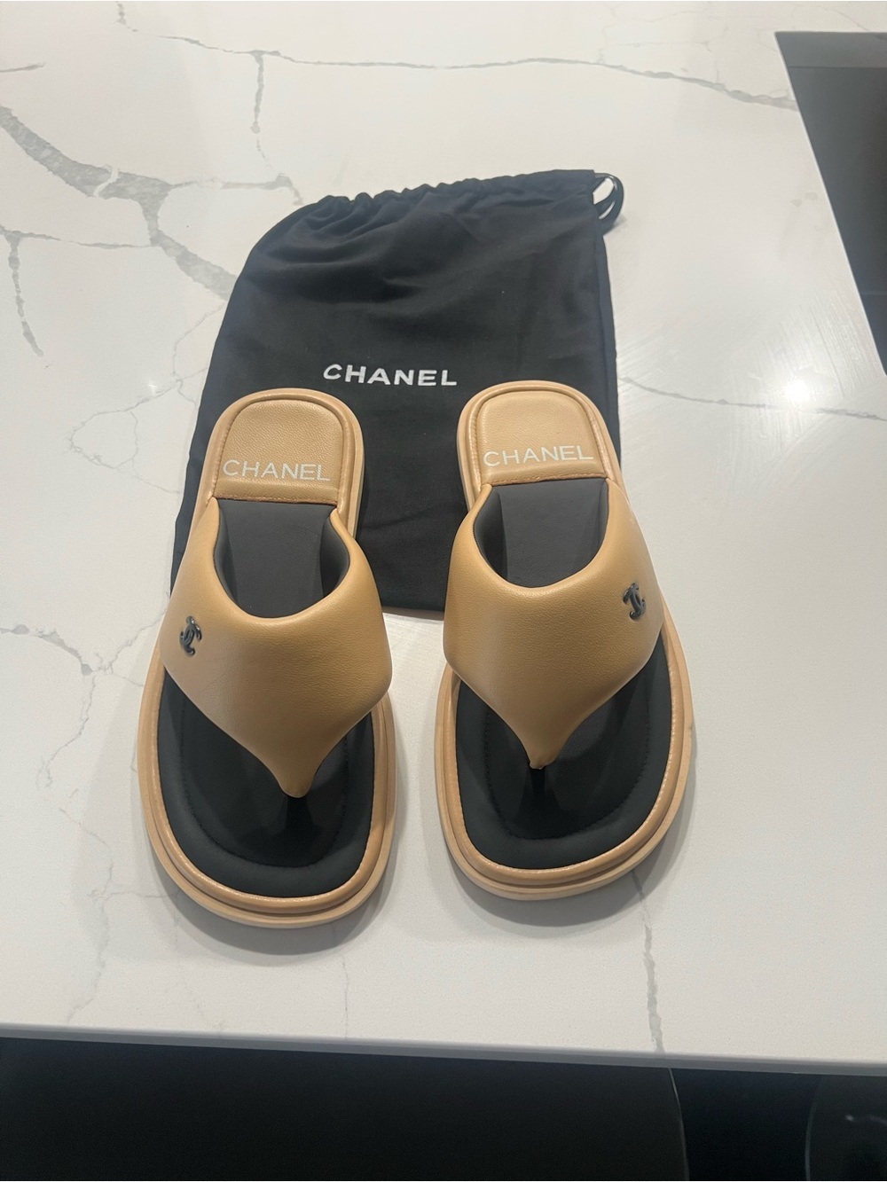 CHANEL Thong Sandals with Black Footbed​